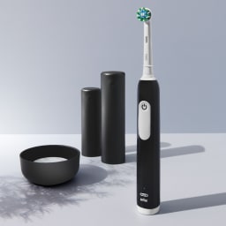 1. Eltandborste Pro1 Svart + Extra Refill