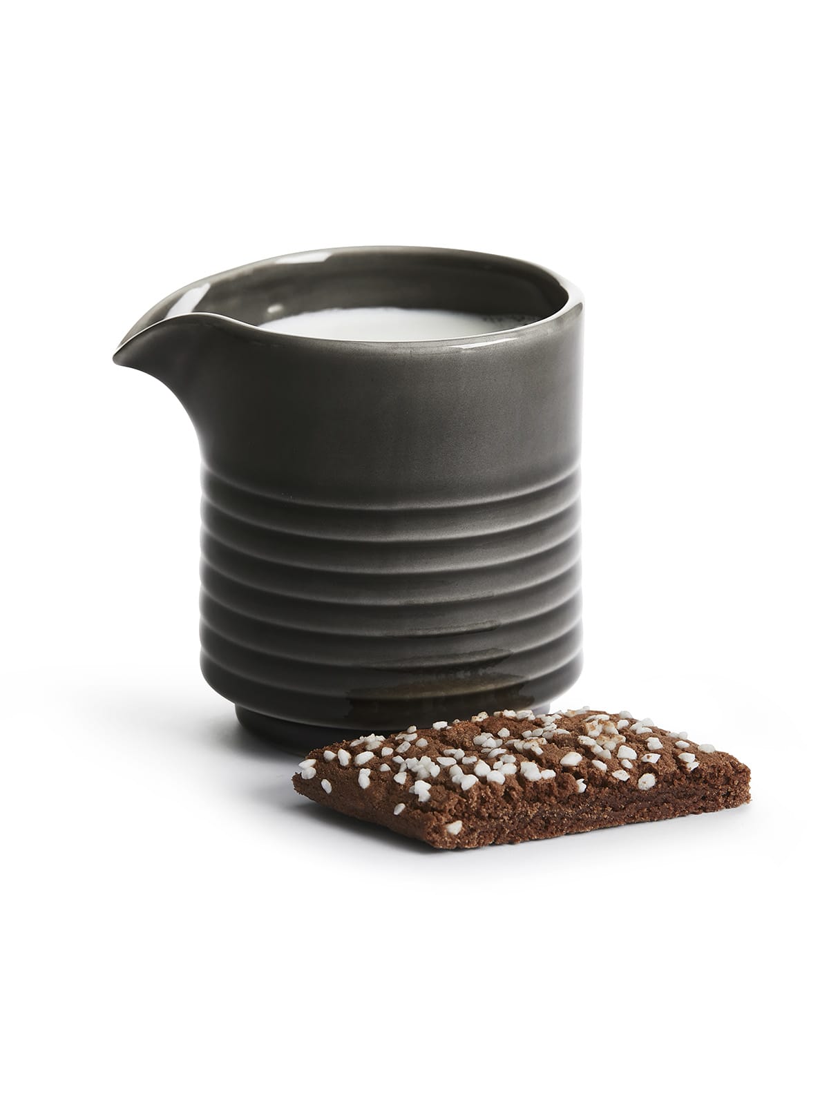 Milk jug with relief